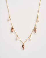 Spiral Shell Charm & Pearl Worn Gold Necklace